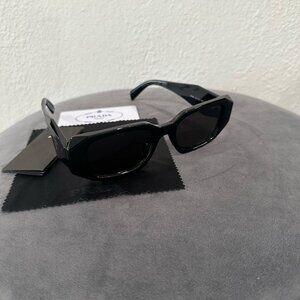 Prada women's black sunglasses (Used normal Wear)